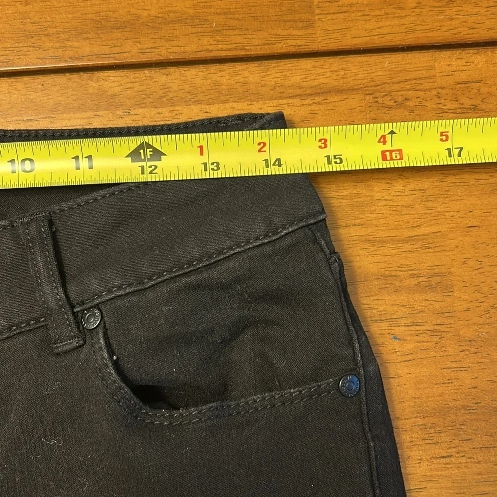 Women’s black skinny jeans size 10.